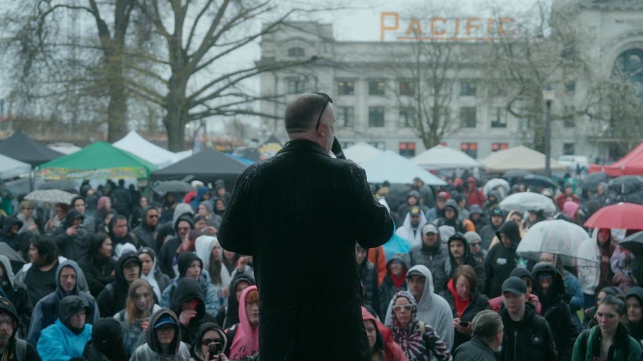 Person speaking at a rally